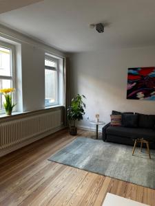 Posezení v ubytování Großzügige 3-Zimmer Altbauwohnung