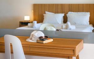 A bed or beds in a room at Ionian Theoxenia