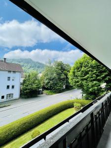 a view of a street from a balcony at LYMA Suites - Studio S25 in Immenstadt im Allgäu