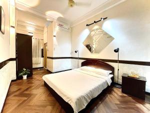 Postel nebo postele na pokoji v ubytování BÊ TÔNG RESIDENCES HOMESTAY