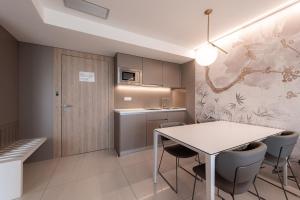 Kuchyň nebo kuchyňský kout v ubytování Aparthotel Joel