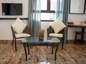 TV a/nebo společenská místnost v ubytování Hotel Hojari - Jabal Samhan, Salalah + 19 fotografií