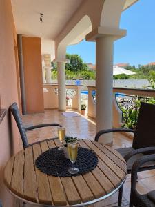 A balcony or terrace at Villa Marija Novalja