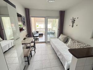 Postel nebo postele na pokoji v ubytování Apartments Sanda