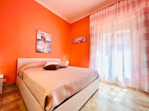 Postel nebo postele na pokoji v ubytování Domus Aurea