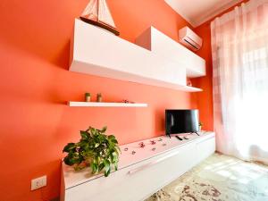 TV a/nebo společenská místnost v ubytování Domus Aurea