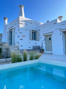 Bazén v ubytování Aegean Breeze House nebo v jeho okolí
