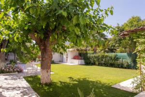 Zahrada ubytování Moukas Seaside Apartments Romantico