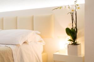 Кровать или кровати в номере Hotel Rosmarina