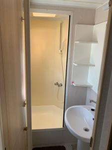 a bathroom with a shower and a sink at Lawendowa Przystań WICKO 3 km od Międzyzdrojów in Międzyzdroje +79 photos