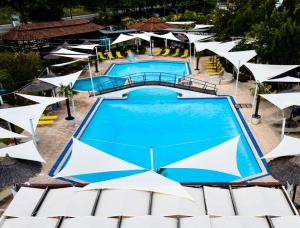 The swimming pool at or close to Oasi