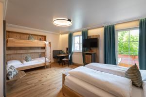 Postel nebo postele na pokoji v ubytování Design Hotel Frauenschuh + 37 fotografií