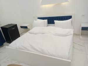 Letto o letti in una camera di Egyptus Pyramids Inn