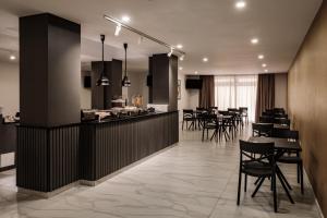 Cuisine ou kitchenette dans l'établissement Urban Isle