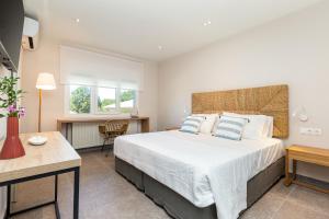Ένα ή περισσότερα κρεβάτια σε δωμάτιο στο AMD House +34 φωτογραφίες