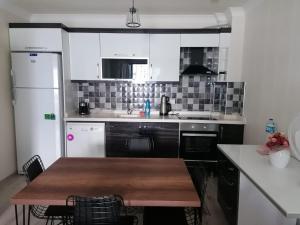 Kuchyň nebo kuchyňský kout v ubytování Eryaman, Wide Luxury Rezidance