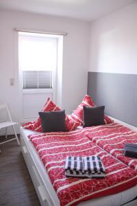 Ein Bett oder Betten in einem Zimmer der Unterkunft Gästehaus Sophie Randa
