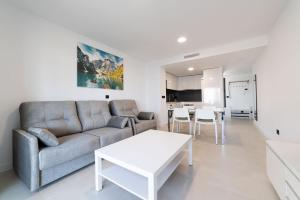 Televízia a/alebo spoločenská miestnosť v ubytovaní Apartamento Nuevo Alexia 1 4 1 en Calpe