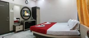 Katil atau katil-katil dalam bilik di Hotel Gujrat