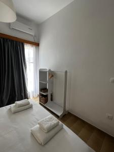 Postel nebo postele na pokoji v ubytování Sifnos Valley