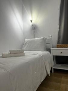 Postel nebo postele na pokoji v ubytování Sifnos Valley