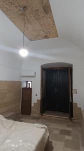 Postel nebo postele na pokoji v ubytování dimora arcobaleno