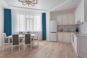 Kuchyňa alebo kuchynka v ubytovaní Arcadia 2nd Pearl Apartment