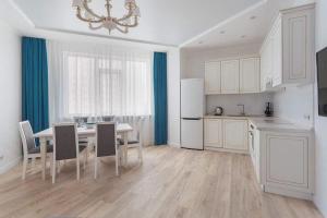 Kuchyňa alebo kuchynka v ubytovaní Arcadia 2nd Pearl Apartment