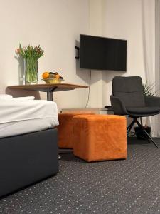TV a/nebo společenská místnost v ubytování Apartment Offenbach am Main