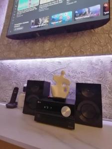 TV a/nebo společenská místnost v ubytování JM Apartman