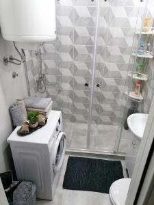 Ein Badezimmer in der Unterkunft JM Apartman