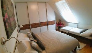 Posteľ alebo postele v izbe v ubytovaní Apartmán AURIS
