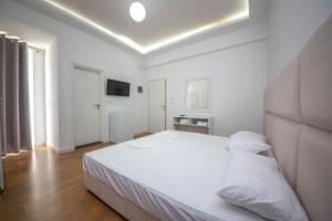 Cama o camas de una habitación en Hotel Myrtaj