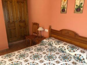 Postel nebo postele na pokoji v ubytování apartamentos casa botero