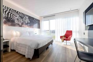Postel nebo postele na pokoji v ubytování Life Hotel