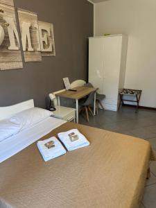 Postel nebo postele na pokoji v ubytování Guest House Brianza Room