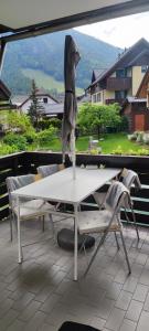 a cape is standing on top of a table at Apartma 198 in Kranjska Gora