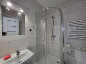 Koupelna v ubytování Pokoje u Małgorzaty + 7 fotografií