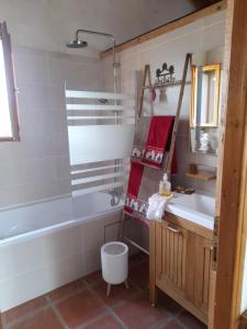 a bathroom with a tub and a sink at Stella Alpina in Rimplas