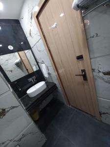 Phòng tắm tại HOTEL TASTE OF INDIA