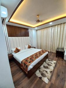 Llit o llits en una habitació de HOTEL TASTE OF INDIA