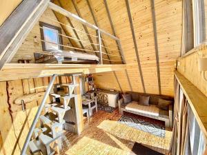 an overhead view of a cabin with stairs and a room at Файна хата 3 in Synevyrsʼka Polyana