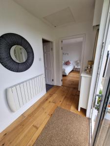 Postel nebo postele na pokoji v ubytování Vimy House