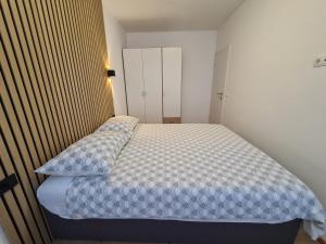 Postel nebo postele na pokoji v ubytování Apartment Skadenca
