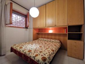 Postel nebo postele na pokoji v ubytování Le Fioriere Appartamento con BOX PRIVATO