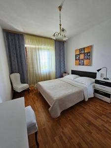 Postel nebo postele na pokoji v ubytování Apartman Kampor