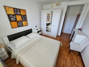 Postel nebo postele na pokoji v ubytování Apartman Kampor