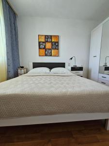 Postel nebo postele na pokoji v ubytování Apartman Kampor