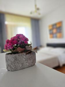 Postel nebo postele na pokoji v ubytování Apartman Kampor