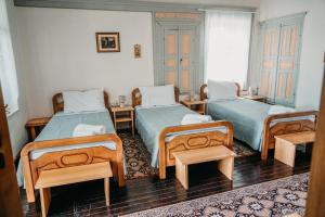 Postel nebo postele na pokoji v ubytování Guest House Edmond